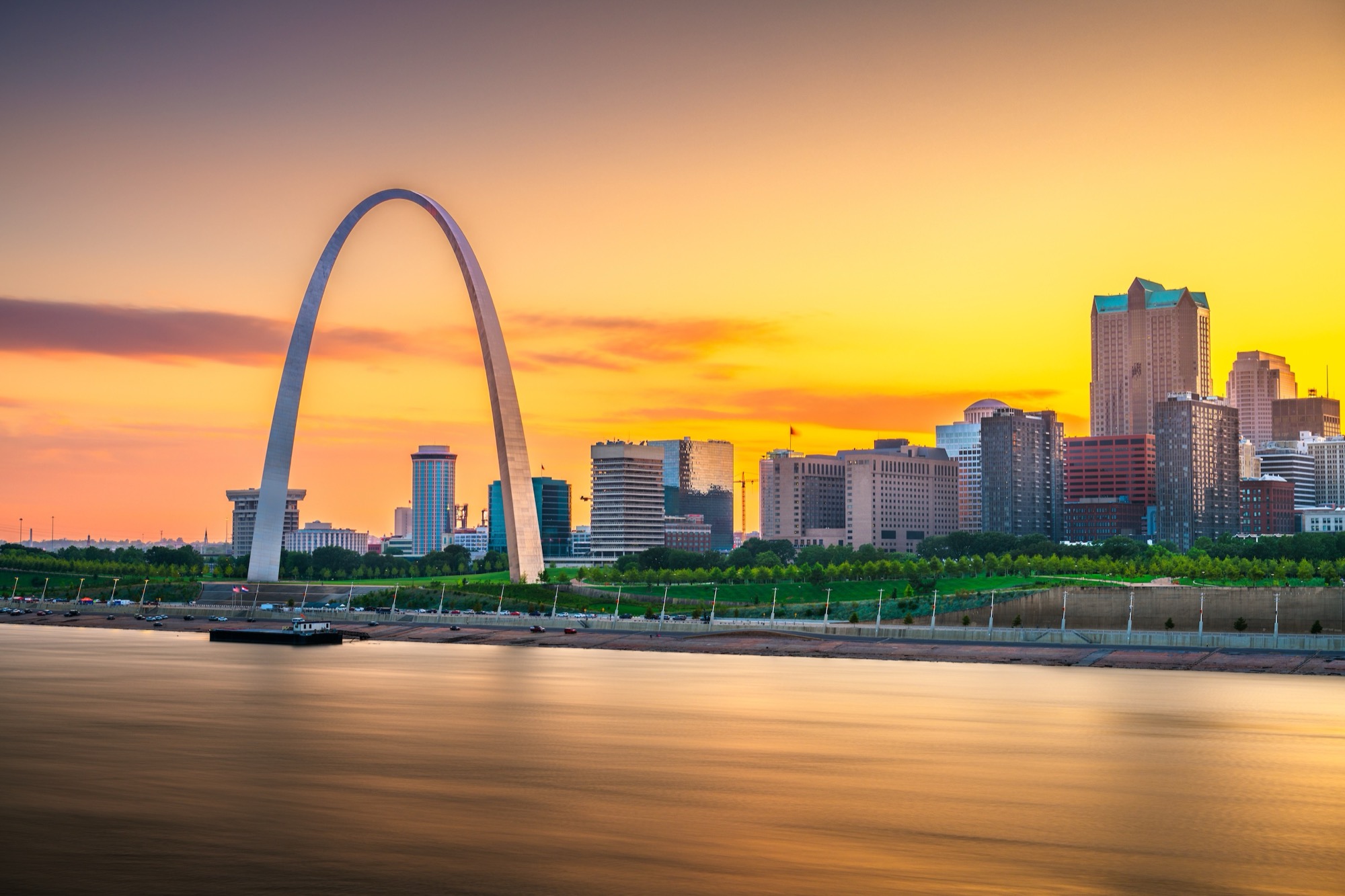 The St. Louis skyline at golden hour with the Gateway Arch
